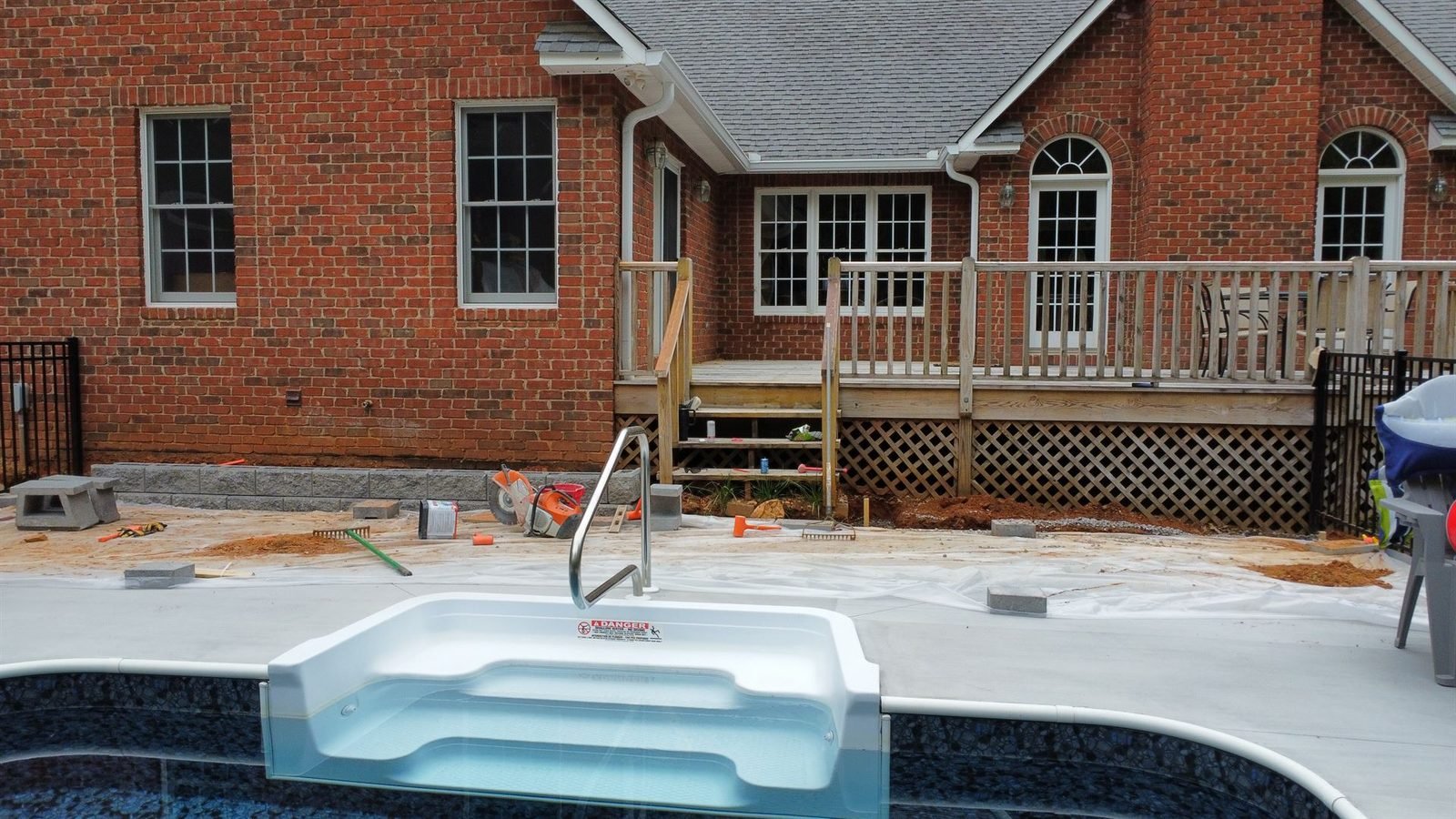 Poolside retaining wall and steps under construction Western NC